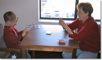 Ethan takes on grandma in a fierce game of Go Fish